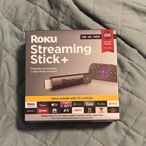 Roku Streaming Stick+ with Black and Purple Remote